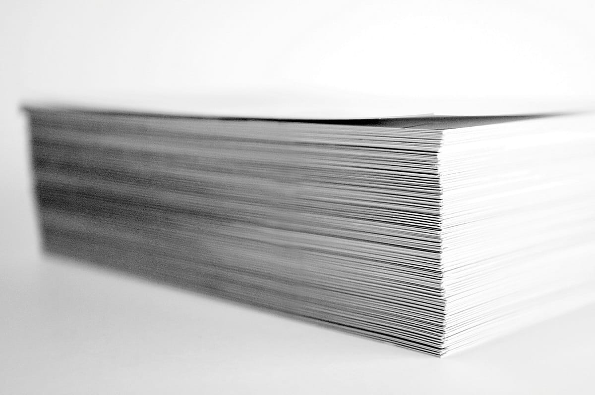 stack of papers, foreign income tax forms