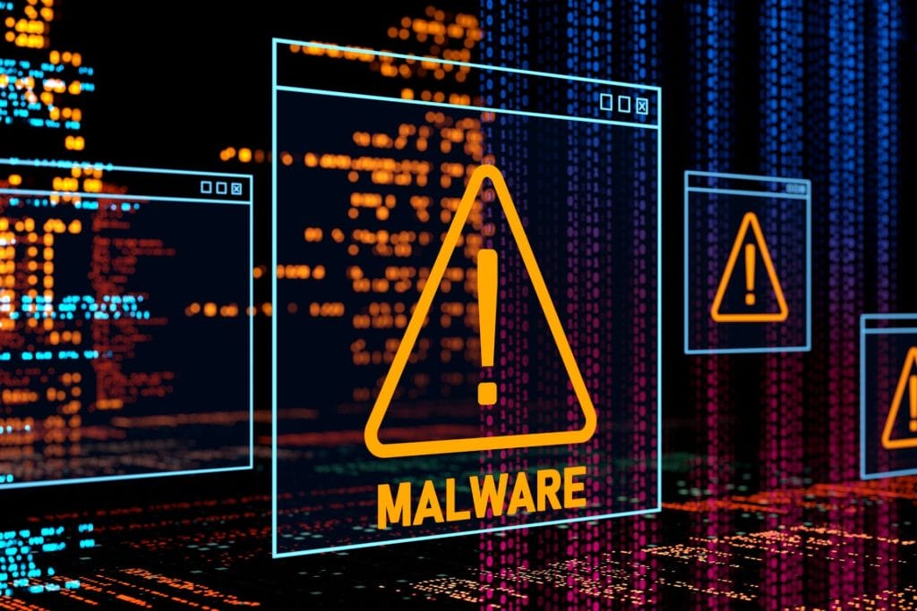 Upozorenje o malware-u, što je često viđeno u kontekstu sajber sigurnosti. Na slici se nalaze prozori s upozorenjem, s istaknutim žutim trouglovima i natpisom "MALWARE" na pozadini digitalnog koda.
Ova slika ilustruje važnost zaštite i opreza u digitalnom okruženju kako bi se sprečile maliciozne aktivnosti koje mogu ugroziti sigurnost podataka i sistema.

