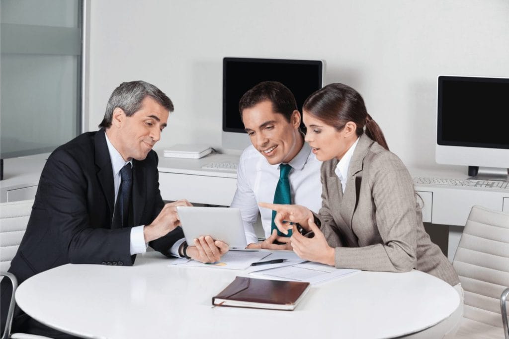 Tax consultants with tablet computer
